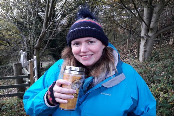 Abi showing off her reusable cup