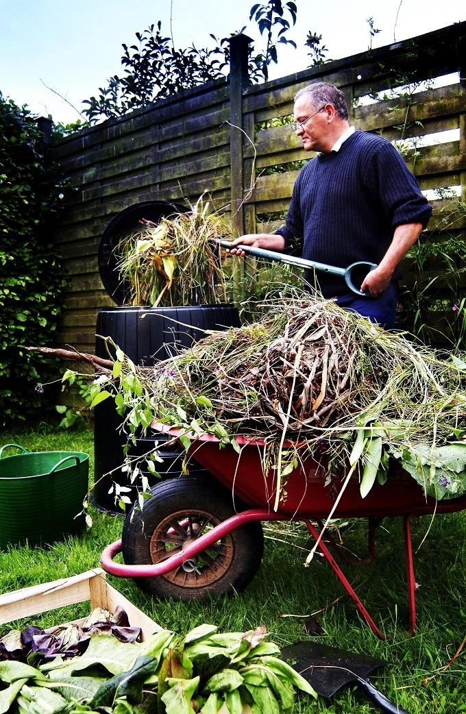 A man working compost.